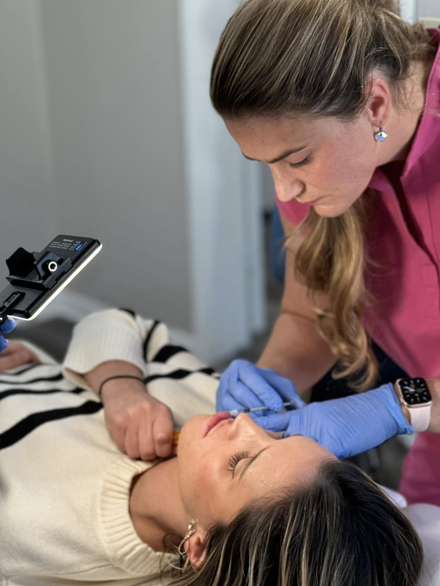 A provider injecting lip filler