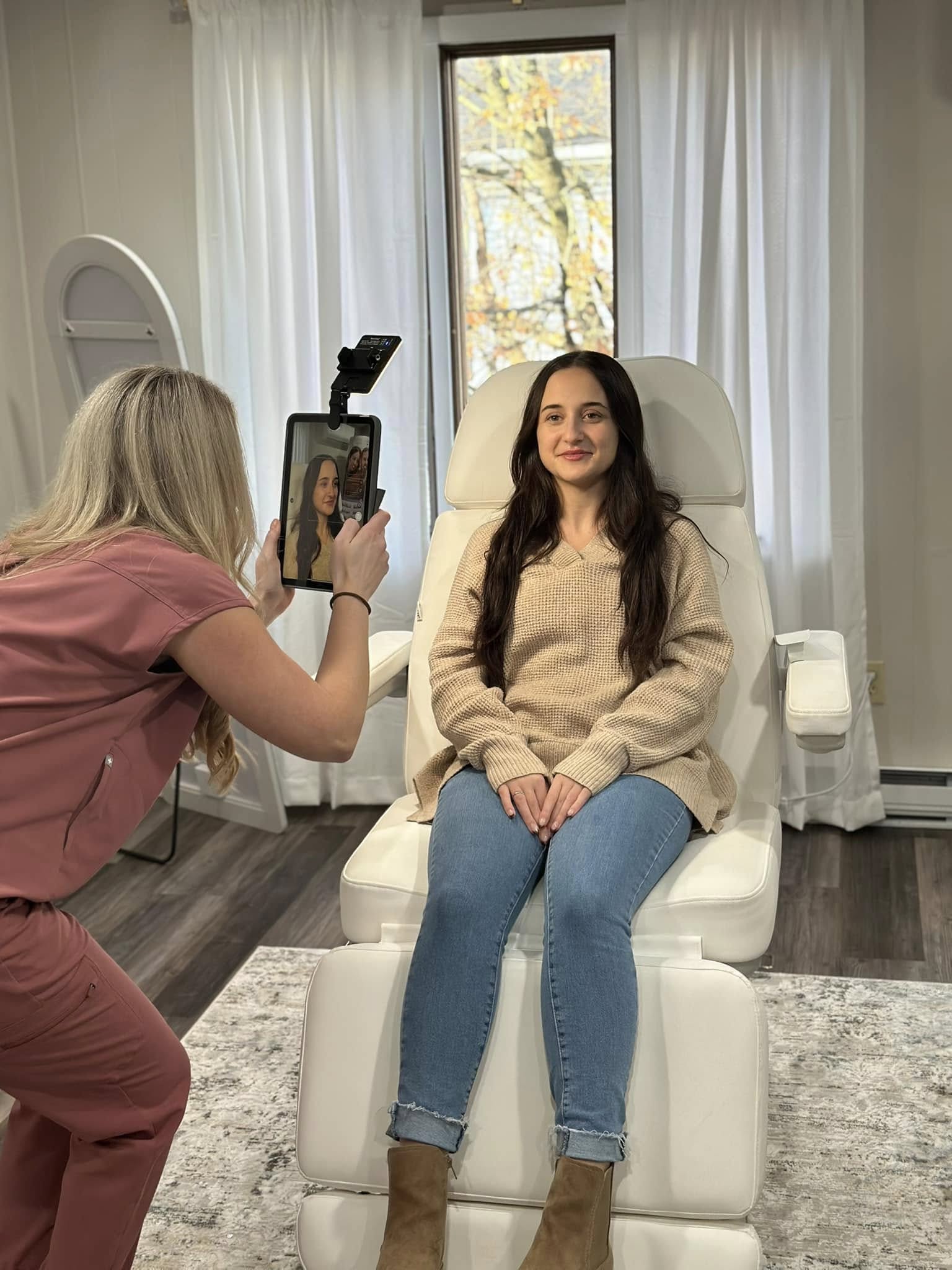 A provider taking photos of a patient before treatment